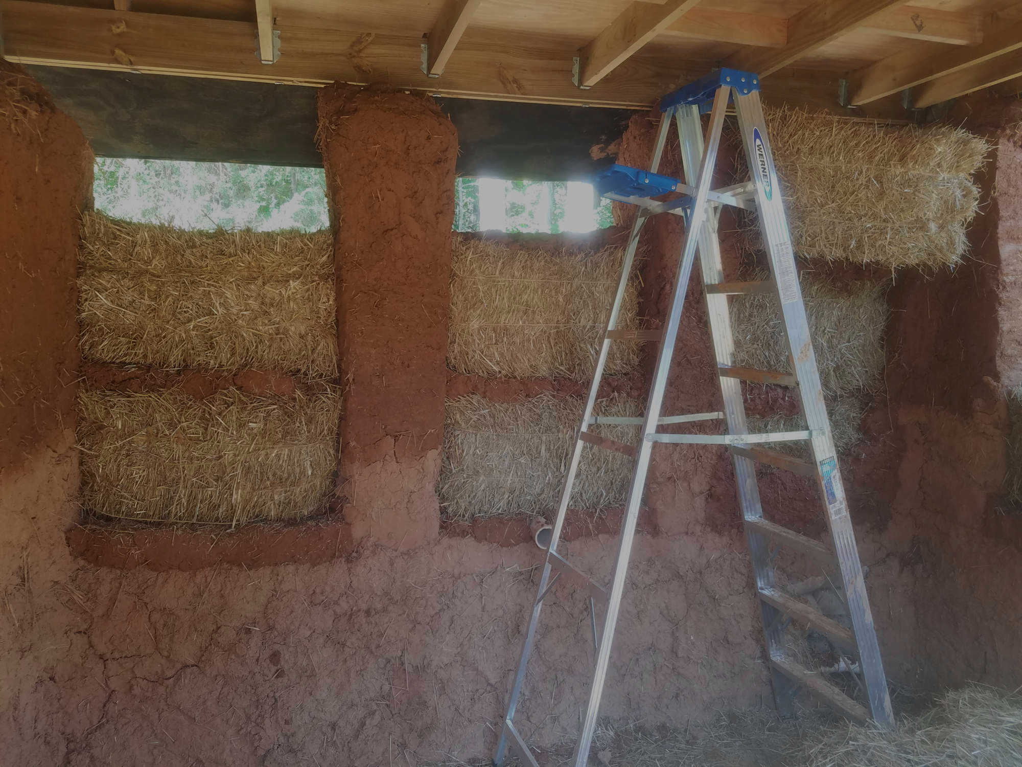 Straw bale walls being put up