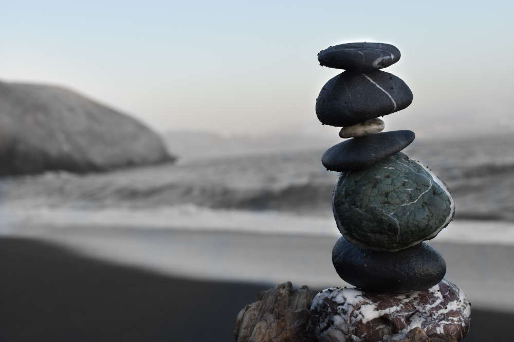 A stack of rocks by the ocean